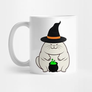 Funny fat cat is wearing a witch costume Mug